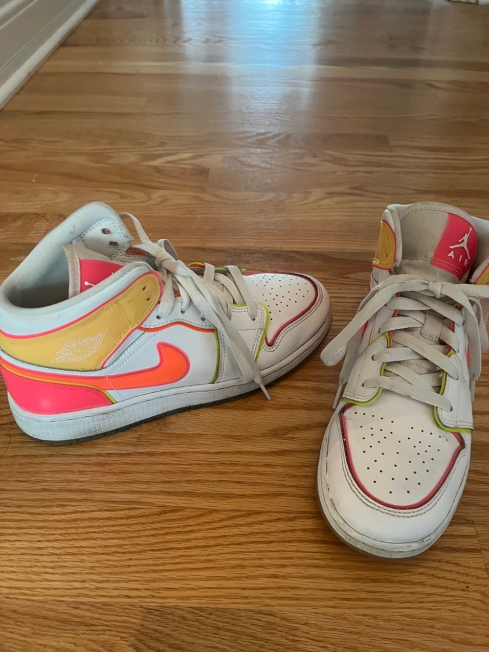 Jordan Kids White Sneakers with Pink and Orange Accents